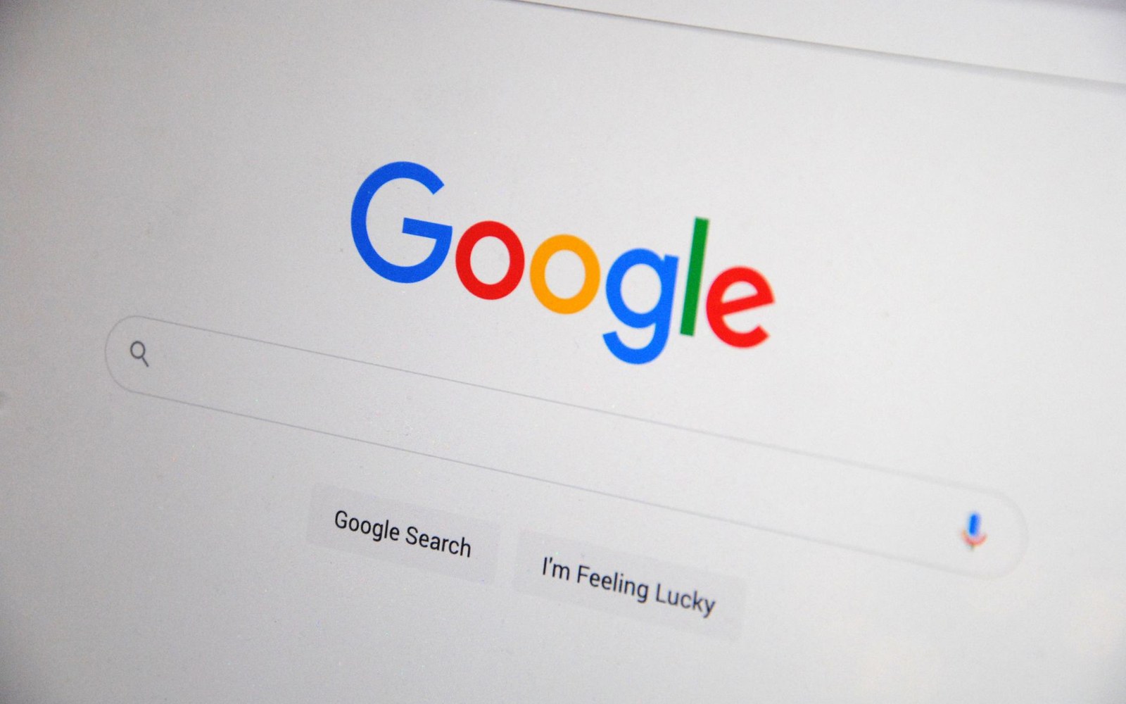 Google's homepage displayed on a screen, showing the search bar and logo
